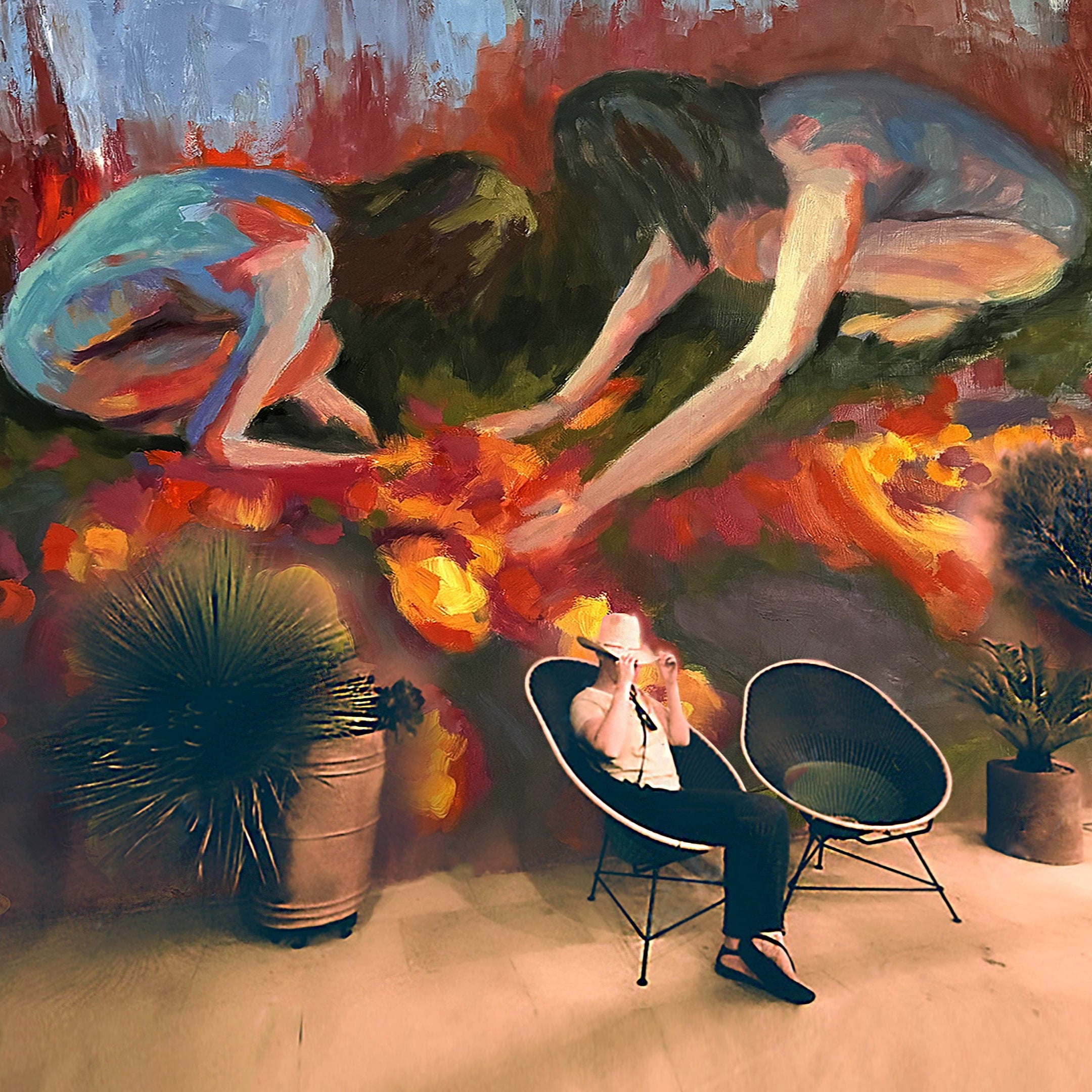 Person sitting in a chair in front of a large abstract figurative painting with a garden scene.